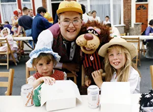 Drinks Prints: Entertainer Mark Brooks and his dog Snuffles join in at the Ruby Street party in Saltburn