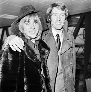 Entertainment. Actor. Michael Crawford and his wife Gabrielle leaving Heathrow this