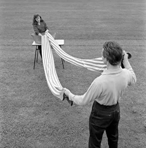 Entertainment: Circus: Barrie Sloan, Billy SmartIs stilt walker seen here washing