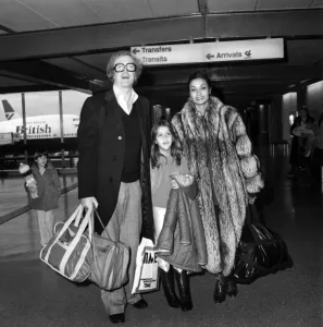 Entertainment: Film Actor: Michael Caine and wife Shakira and daughter Natasha (7