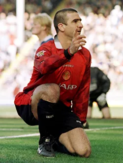 Eric Cantona of Manchester United celebrates his goal against Blackburn Rovers at Ewood