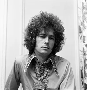 Eric Clapton of Cream shows off his curly hair that is created for him by a West End