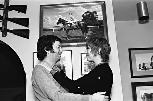 Eric Clapton and wife Pattie Boyd, pictured in front of a photograph of his racehorse Via