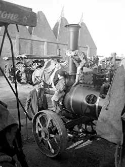 00169 Prints: Eric and Donald Skinner with Chris Lambert at Steamroller Museum December 1951