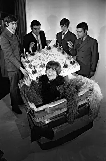 Eric Idle, Terry Jones, Michael Palin and David Jason help Denise Coffey celebrate her
