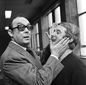 00472 Collection: Eric Morecambe and Ernie Wise, still able to enjoy a laugh as they take a break