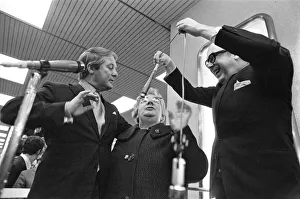 Eric Morecambe and Ernie Wise, accompanied by Miss Great Britain Carolyn Moore