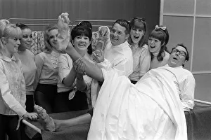 Eric Morecambe and Ernie Wise June 1965 clown it up with chorus girls in