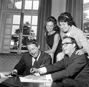 Eric Morecambe and Ernie Wise sign contract to appear in new film