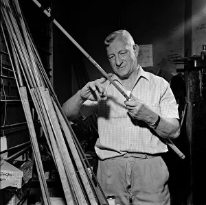 Ernest Stamford from Sheffield puts the finishing touches to one of his hand made fishing