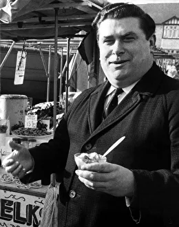 Stall Prints: Ernie Lea is unable to sell any jellied eels at Calais Market after taking a barrow over
