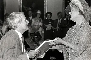 ERNIE WISE RECIEVES A COMMENDATION FROM THE QUEEN MOTHER FOR HIS WORK IN