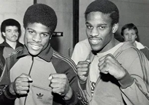 00114 Prints: Errol Christie middleweight boxer (left) poses for a photograph with his brother Mike
