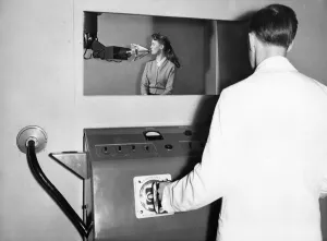 Technician Prints: Esme puts on lipstick for pretty Eve Ward, 18, of Belvedere, Kent