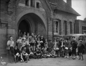 Evacuated Birmingham schoolchildren seen here cooling off with an ice cream whilst