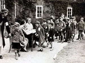 Gas Masks Prints: Evacuees bound for Canada arrives at their assembly point for registration before