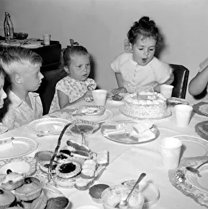 00176 Prints: Eve Black celebrating her 4th Birthday Party with friends - Blowing out
