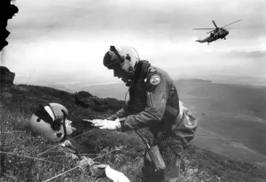 00375 Prints: Evening Chronicle reporter Rex Garratt (being rescued) joined a RAF search