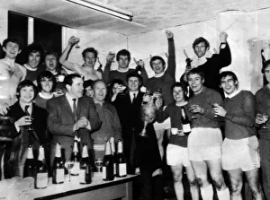 Everton celebrate in the Goodison Park dressing room after winning the League
