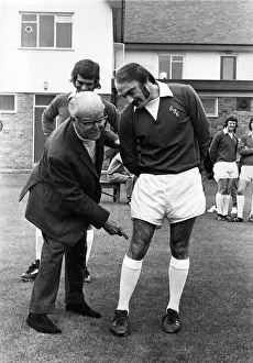 Injury Prints: Everton football club chairman Mr John Moores has a feel at the injured knee of John