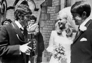 Everton footballer Alan Ball as photographer at the wedding of his teamate Howard Kendall
