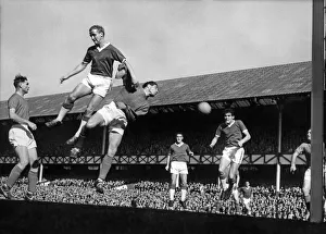 1961 Prints: Everton footballer Alex Young and Ipswich goalkeeper Hall go up for a corner kick