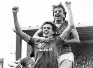 00530 Prints: Everton footballer Kevin Sheedy congratulated by teammate Graeme Sharp after he scored