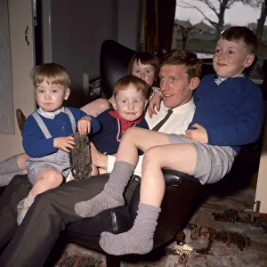 Everton footballer Tony Kay with his children at home after his release from prison