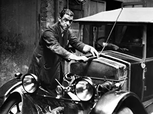 Mechanic Prints: Everton footballer William Dixie'Dean dressed in mechanic overalls as he goes