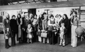 Wags Prints: Everton footballers wives, girlfriends and children on the platform at Lime Street Staion
