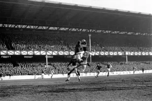 00250 Prints: Everton v. Arsenal: West punches away corner kick from McLintockIs head with Hurst
