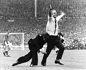 Everton v Sheffield Wednesday FA Cup Final May 1966 A fan is Rugby tackled by a