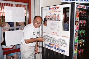 T Shirt Prints: Ex footballer Jimmy Greaves at the worlds first spectacle vending machine