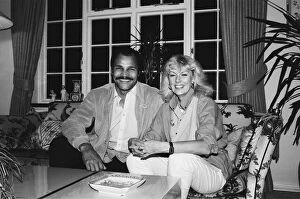 01403 Collection: Ex-World Boxing Champion John Conteh at home with wife Veronica. 5th October 1984