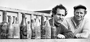 Bottles Prints: An excavator uncovered these old bottles from breweries all over the North East