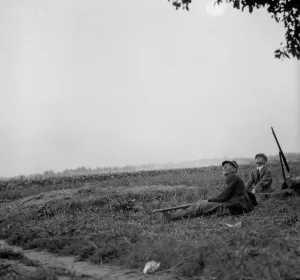 Taking Aim Prints: A more exciting sport than grouse shooting. A Belgian soldier trying to bring down a