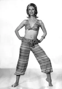 An exotic two-piece straight from the Arabian Nights. The harem pants are gathered