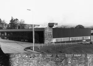 Textiles Prints: Exterior view of the Laura Ashley textiles factory in Newtown, Powys Wales