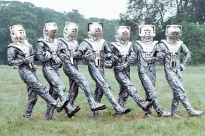 Extras dressed as Cybermen seen here on location near Arundel during the filming of