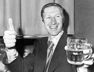 00245 Prints: An exuberant Jack Charlton of Leeds United celebrates with a pint