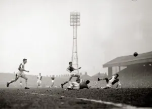00239 Prints: FA Cup Quarter Final Burnley v Blackburn Rovers March 1960 Connolly skips over