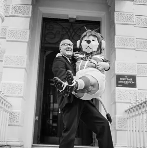 Mascot Prints: FA Secretary Denis Follows pictured with World Cup Willie