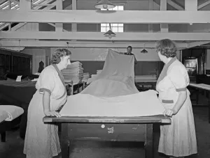 Fabric is measured and checked for imperfections at John Heathcoats factory in Tiverton