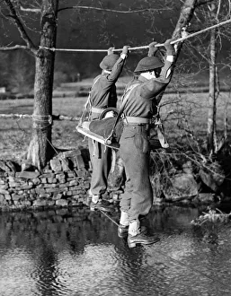 01436 Prints: Facility Visit. Overcoming the difficulty of crossing a river without boat or raft shown