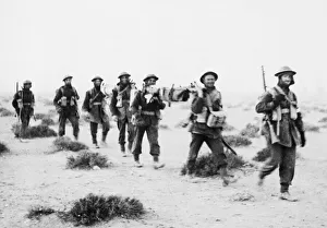 01460 Prints: Fall of Tobruk. British troops advancing towards the town of Tobruk during Second