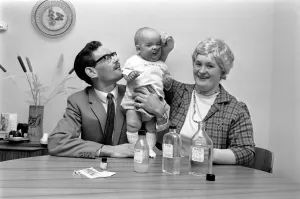 Parents Prints: Families: Children: Babies. Baby Sean takes the drugs which keep him alive