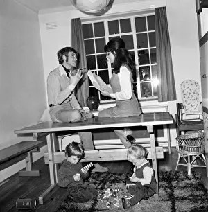 Families: Mother, father and children. Man and woman in their home. Couples