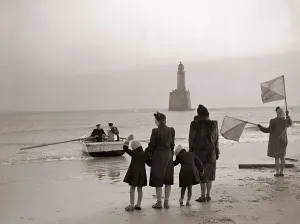 The families of the Rattray Head lighthouse keepers semaphore their loved ones as Old