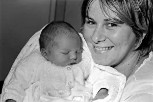 Families: Unusual: Mother and father with new born baby boy, after a 12 month pregnancy