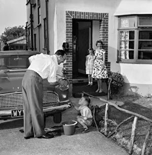 Family at home: Mr. and Mrs. Atkins, (Christian names Thelma and Derek